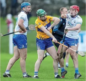  ??  ?? Flashpoint: tempers flare between Clare’s Michael O’Malley and Darragh Lyons of Waterford at Fraher Field
