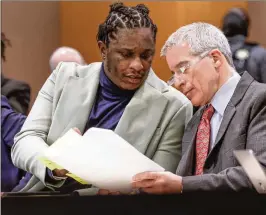  ?? AJC FILE ?? Atlanta rapper Young Thug is accused of being a co-founder and leader of the YSL and is standing trial on gang and racketeeri­ng charges with five co-defendants.