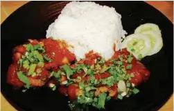  ??  ?? Grouper fillet rice is a simple dish prepared right.