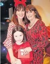  ?? ?? Heartfelt Frances Cummings (left), with Mhairi Taylor and daughter Ella, organised a Red Hearts day to raise money for Eilidh’s charity