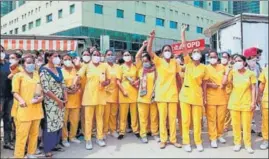  ?? HT PHOTO ?? ■
Nurses staging a protest at a hospital in Ludhiana on Sunday.