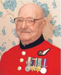  ??  ?? Sgt Carrie, above, finally added a flight engineer brevet, or badge, to his distinctiv­e scarlet uniform after the evacuation of Dunkirk, above right.
Pictures: Pa/getty.