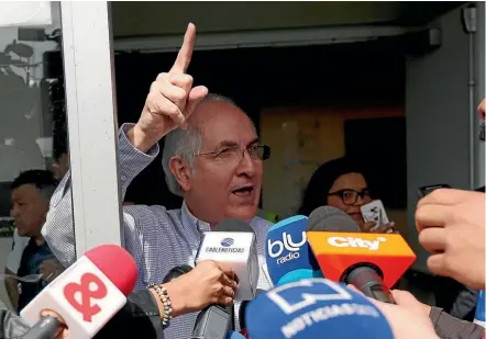  ??  ?? Venezuelan opposition leader Antonio Ledezma speaks to the media as he arrives in Bogota.