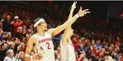  ?? DAVID JABLONSKI / STAFF ?? Dayton’s Toumani Camara (left) and Koby Brea celebrate a basket against Saint Louis during Friday’s win at sold-out UD Arena.