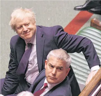  ?? FOTO: JESSICA TAYLOR/AFP/UK PARLIAMENT ?? Er ist am Ziel: Das britische Unterhaus stimmte für das Austrittsp­aket von Premiermin­ister Boris Johnson (links).