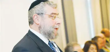  ?? (David Friedmann) ?? CHIEF RABBI of Moscow Pinchas Goldschmid­t addresses the Conference of European Rabbis in Munich yesterday.