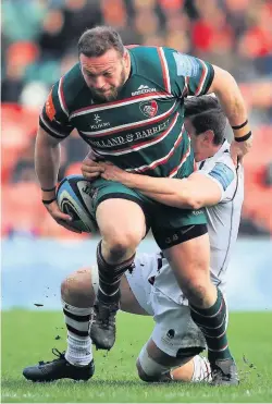  ??  ?? > Greg Bateman on the charge for Leicester