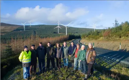  ??  ?? Members of the Croghan Cluster at Raheenleag­h Wind Farm to officially open the Raheenleag­h Wind Farm amenity walks.