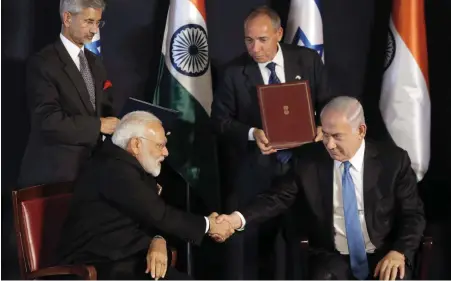  ?? PICTURE: AP ?? SHAKE-UP: Indian Prime Minister Narendra Modi, left, shakes hands with Israeli Prime Minister Benjamin Netanyahu during their meeting at the King David Hotel in Jerusalem.