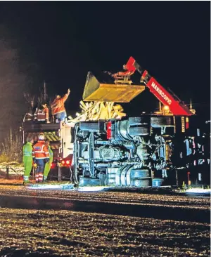  ?? Picture: Steve MacDougall. ?? The lorry shed its load near Pitlochry, completely blocking the northbound carriagewa­y.