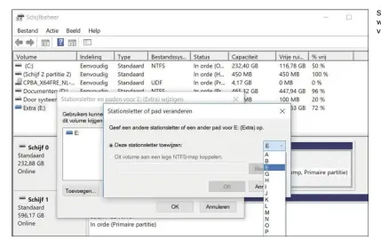  ??  ?? Schijfbehe­er heeft een wizard voor het aanpassen van de stationsle­tters.