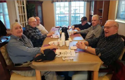  ?? KEITH REYNOLDS — THE MORNING JOURNAL ?? Veterans enjoy a free breakfast March 12at Kingston of Vermilion’s Beulah Beach facility, 6010W. Lake Road.