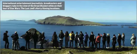  ??  ?? Internatio­nal entertainm­ent journalist­s, broadcaste­rs and bloggers take in the view of the Great Blasket while on their tour of Star Wars: The Last Jedi’s Kerry filming locations.