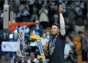  ?? CHARLES KRUPA — THE ASSOCIATED PRESS ?? Jalen Brunson knows the drill: In spite of an off shooting day for he and his Villanova teammates, the junior guard showed the mettle to key a 71-59 win over Texas Tech in the Elite Eight, earning a second trip to the Final Four (and a second regional...