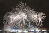  ?? REUTERS ?? FIREWORKS explode over the London Eye Ferris wheel as Britons across the country welcome the New Year, in London, Britain, Jan. 1.