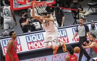  ?? ARMANDO L. SANCHEZ/CHICAGO TRIBUNE/TNS 2021 ?? Jazz center Rudy Gobert was voted NBA defensive player of the year three times, All-Defense six times and All-NBA four. His attributes make him a great defender and rebounder.