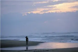  ?? THE ASSOCIATED PRESS ?? The Cape Hatteras National Seashore makes up much of Hatteras Island, meaning there’s no developmen­t except in the seven villages.