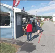  ?? MELISSA SCHUMAN - MEDIANEWS GROUP ?? A line of hungry customers wait their turn in front of Brickyard Grill.