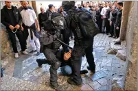  ?? ?? Arrests at the Al-Aqsa Mosque after a Ramadan standoff