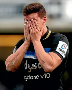  ??  ?? Bath’s Freddie Burns cannot believe his mistake after he botched the matchwinni­ng try against Toulon