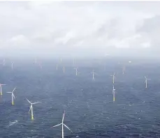  ?? — Reuters ?? Power-generating windmill turbines are pictured at the ‘Amrumbank West’ offshore wind park in the northern sea near Amrum, Germany.