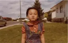  ??  ?? Judy Trinh as a young girl in Lethbridge.