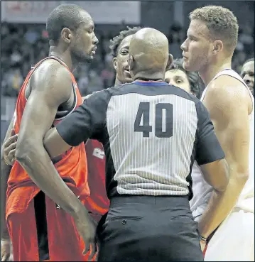  ??  ?? Raptors forward Serge Ibaka (left) and Clippers star Blake Griffin weren’t treating the early Wednesday contest like an exhibition tilt. They went at it repeatedly.