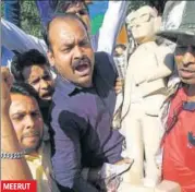  ?? HT PHOTO ?? MEERUT A new statue of Dalit icon BR Ambedkar being installed after one was vandalised in Meerut on Wednesday. Locals said the statue was vandalised on August 4 last year too.