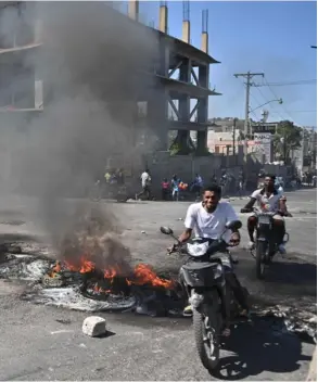  ?? ?? Bandas armadas han tomado el control de zonas enteras de Haití. Solo en enero pasado murieron 806 personas de forma violenta. AfP