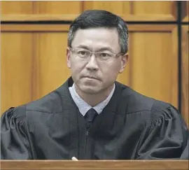  ?? George F. Lee Honolulu Star-Advertiser By Jaweed Kaleem ?? U.S. DISTRICT JUDGE Derrick Watson said those challengin­g the travel ban need to go to the Supreme Court to get clarificat­ion on how to implement it.