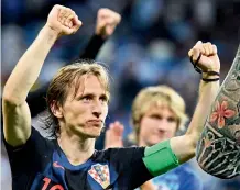  ?? — AFP ?? Croatia captain Luka Modric celebrates his side’s victory over Argentina on Thursday.
