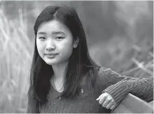  ?? AP-Yonhap ?? High school student Grace Hu, 16, of Sharon, Mass., stands for a photograph near Sharon High School in Sharon, Sunday.