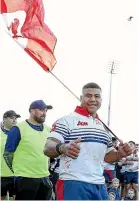  ?? ROBYN EDIE/STUFF ?? Pirates-Old Boys did not lack for crowd support. Right: Tighthead prop Paul Latu of Woodlands proudly displays the Tongan flag as he lines up to get his winners’ medal after the Galbraith Shield final.