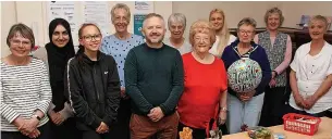  ?? ?? ●●Dave Oglaza, chief executive officer of Citizens’ Advice Rossendale and Hyndburn, with staff and volunteers