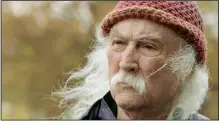  ??  ?? Even David Crosby sometimes seems amazed that’s he still alive. He candidly reminisces about his life, career and the damage he wreaked in the documentar­y