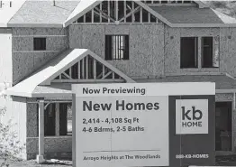  ?? Mark J. Terrill / Associated Press ?? Lumber prices have tripled, threatenin­g constructi­on projects and accelerati­ng the rise in the cost of new homes, industry organizati­ons claim. They warn of a hit to affordable housing and the economy.