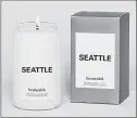  ?? HOMESICK CANDLES PHOTOS ?? The Seattle candle combines the scent of pine needles with lemon, cedar and the distinctiv­e fragrance of coffee.