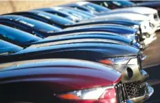  ?? ASSOCIATED PRESS FILE PHOTO ?? A long line of unsold 2017 and 2018 Maserati Levantes sits on a dealer’s lot in Highlands Ranch, Colo.