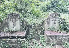  ??  ?? Graves in Bukit Brown cemetery, one of the oldest remaining cemeteries Singapore, which is scheduled to be cleared for housing by 2030.