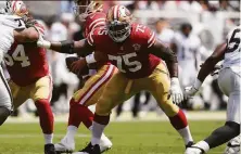  ?? Tony Avelar / Associated Press ?? Niners guard Laken Tomlinson is among the team’s strongest players and can squat more than 600 pounds.