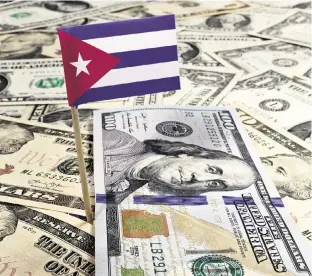  ?? EYEGELB Getty Images ?? Remittance­s sent by Cuban Americans are behind the expansion of the private sector in Cuba.