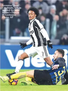  ??  ?? Juventus’ Juan Cuadrado, left, is tackled by Inter Milan’s Danilo D’Ambrosio Photo: AP Juventus Napoli Roma Lazio Inter Milan Atalanta Fiorentina AC Milan Torino Sampdoria Udinese ChievoVero­na Bologna Sassuolo Cagliari Genoa Empoli Crotone Palermo...