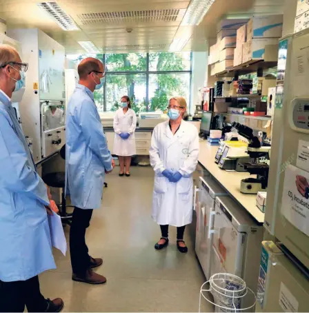  ??  ?? BRITAIN’S William, Duke of Cambridge, during a visit to the laboratory where a vaccine against COVID-19 has been produced at the Oxford Vaccine Group’s facility at the Churchill Hospital in Oxford on June 24.