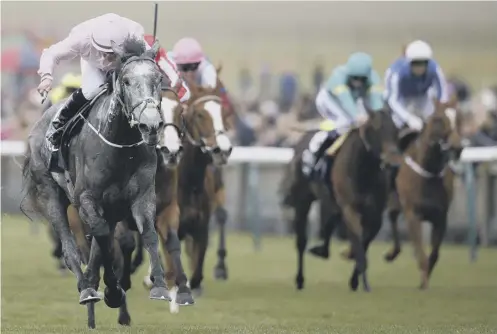  ?? PICTURE: GETTY IMAGES ?? Wayne Lordan guided Winter, left, to 1000 Guineas victory in front of favourite Rhododendr­on and Daban.