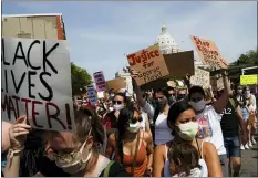  ?? JOHN MINCHILLO — THE ASSOCIATED PRESS ?? In this May 31, 2020, file photo, protesters march away from the State Capitol, in St. Paul, Minn.