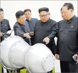  ??  ?? Reuters North Korean leader Kim Jong Un inspects a missile. Hawaii is responding to potential North Korean missile launches by resuming tests of its air raid sirens.