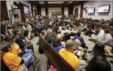  ??  ?? A packed hearing room attends a Massachuse­tts Legislatur­e’s Committee on Public Safety and Homeland Security public hearing concerning a bill that calls for sharp limits on cooperatio­n between federal immigratio­n officials and state and local law...