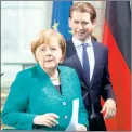  ??  ?? Asyl: Kurz treibt Merkel vor sich her.