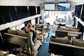  ?? [PHOTO BY PAUL HELLSTERN, THE OKLAHOMAN] ?? Officials have theater seating looking out the back car of an Amtrak train traveling between Oklahoma City and Kansas City.