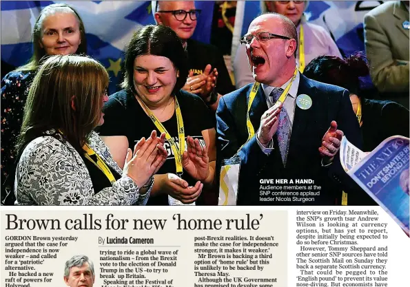  ??  ?? GIVE HER A HAND: Audience members at the SNP conference applaud leader Nicola Sturgeon